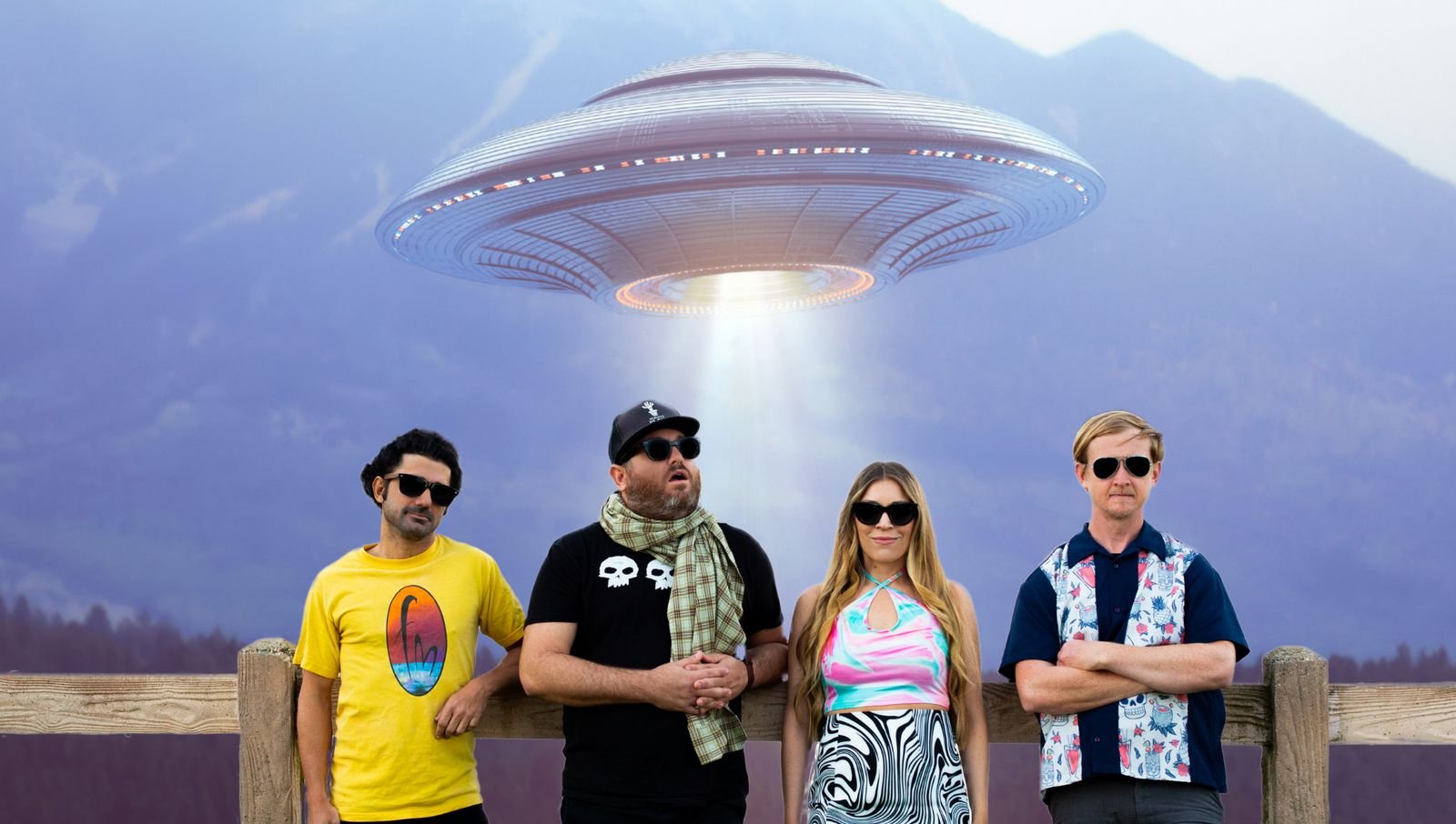The four Cabbys on a fence under a flying saucer
